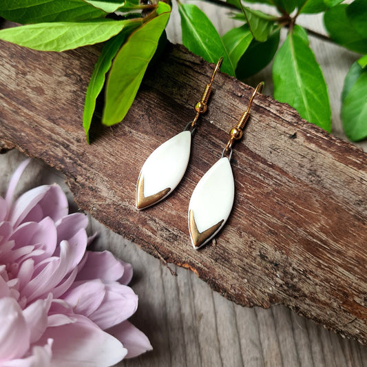Handmade ceramic earrings with 24c gold small white leaf
