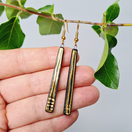 Handmade black ceramic dangle earrings with 24c gold elegant jewellery