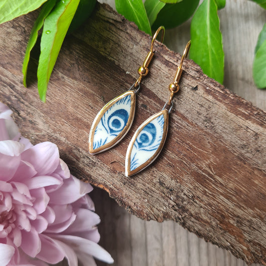 Handmade ceramic earrings with 24c gold (white and blue ceramic peacock)