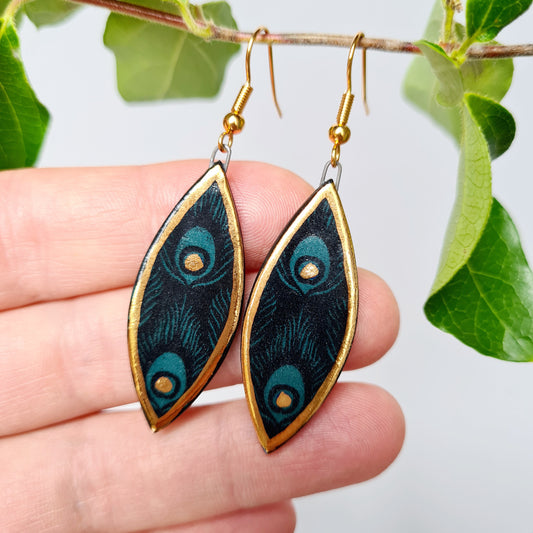 Handmade ceramic leaf shaped earrings with peacock feather detail and 24c gold medium size