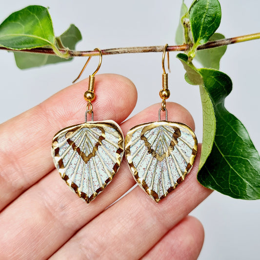 Handmade ceramic earrings with 24c gold light colour leaf