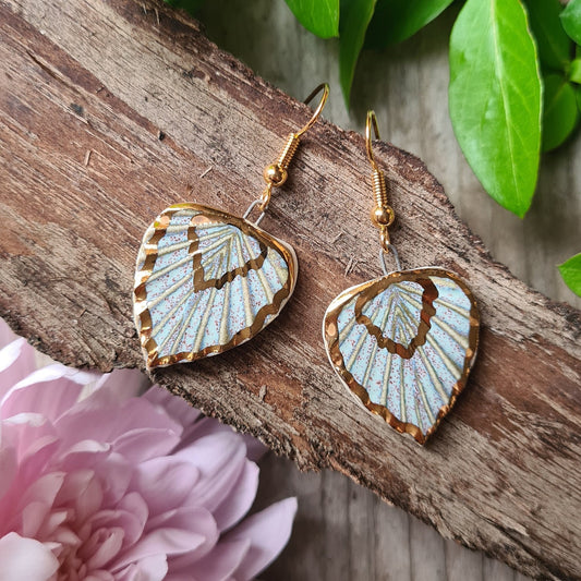 Handmade ceramic earrings with 24c gold light colour leaf